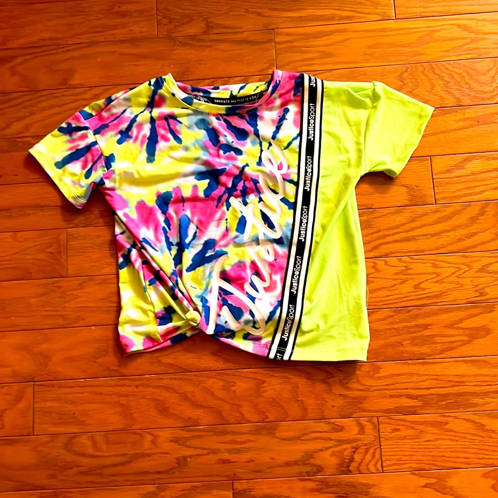 A girls shirt that is tie-dye kinda.